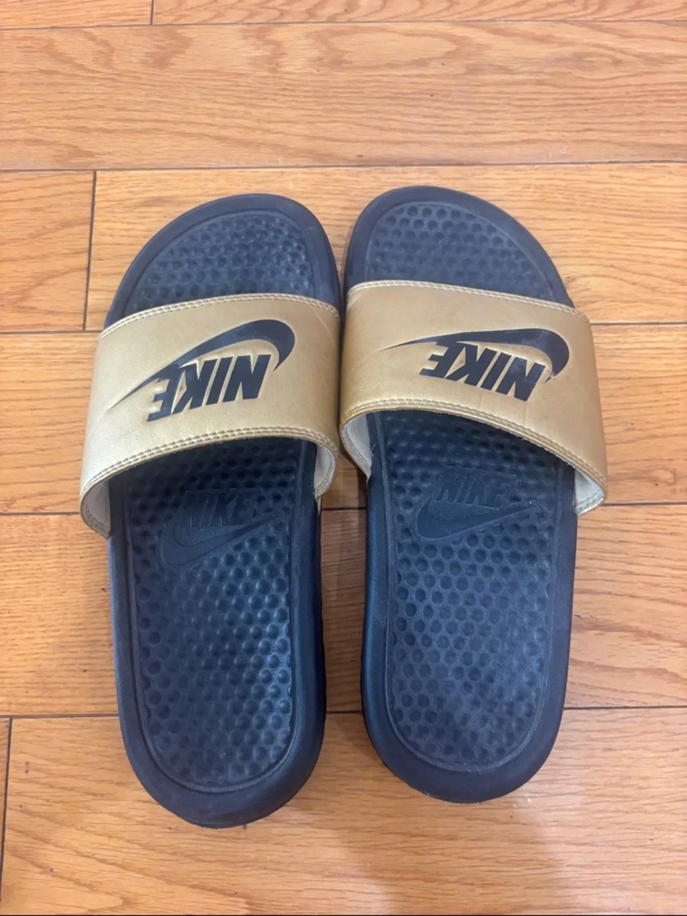 Nike Black and Gold Slide Sandals, women’s size 6